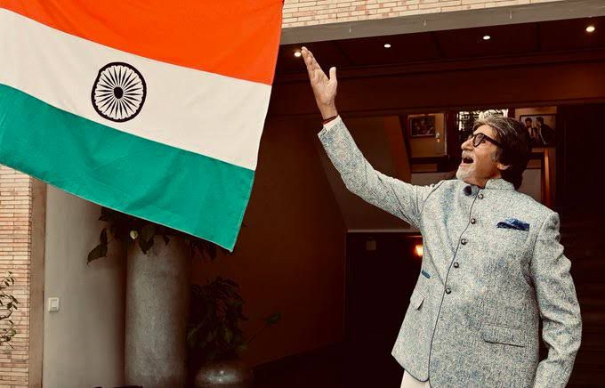Amitabh Bachchan with the national flag